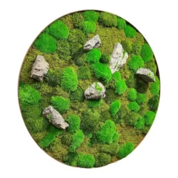 Circular wall art made of textured green moss and decorative grey stones.