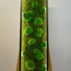 Vertical LED moss wall art with green bun and flat moss in a black frame with inner edge lighting