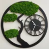 Round tree silhouette wall clock with preserved moss foliage and integrated Roman numeral dial