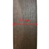 Close-up of dark wood grain frame profile with red arrow marking 57 mm outer width.
