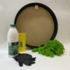 DIY moss art kit supplies with round black frame, bottle of glue, scraper tool, black gloves, and green reindeer moss
