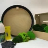 DIY round moss art kit with circular black frame, assorted preserved moss, adhesive bottle, scraper, and gloves