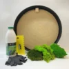 DIY round moss art kit with circular wooden frame, adhesive bottle, notched spreader, gloves, and preserved moss