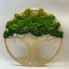 Round wooden tree wall art with layered green preserved moss canopy and white power cord