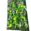 Vertical moss wall panel featuring textured green moss, ferns, and preserved botanical foliage on white background.