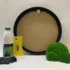 Round DIY moss art kit with circular frame, preserved moss, adhesive bottle, notched spatula, and protective gloves.