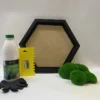 DIY hexagon moss wall art kit with frame, craft glue, applicator tool, protective gloves, and preserved ball moss.