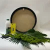 Round DIY moss art kit with circular frame, adhesive bottle, spreader tool, and assorted preserved foliage.