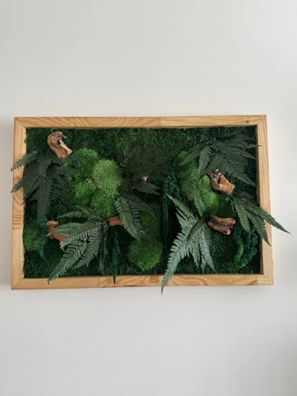 Rectangular preserved moss wall art with foliage and wood details in frame