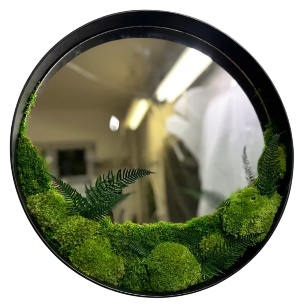 Round wall mirror featuring preserved moss and fern botanical arrangement