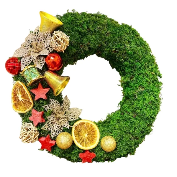Preserved moss wreath decorated with dried fruit slices and festive holiday ornaments