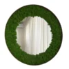 Round wall mirror bordered with preserved lichen moss inside a circular frame