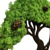 Close-up of textured green reindeer moss and pine cones on dark brown wood Tree of Life wall decor