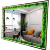 Rectangular backlit wall mirror with preserved moss border and wooden frame reflecting a living room