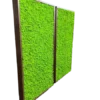 Modular room dividers featuring bright green lichen moss panels set in dark wood frames on a black background.