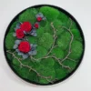 Round moss wall art featuring preserved roses and natural branches in a circular frame