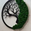 Round Tree of Life moss wall art with black dryad silhouette and green reindeer moss, mounted on a textured white wall.