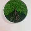 Round moss wall art featuring a wood branch tree and bright green moss canopy inside a white circular frame.