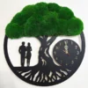 Round wall clock featuring tree of life with preserved moss canopy, couple silhouette, and analog clock face