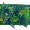 Close-up of jungle plant wall art featuring preserved fern fronds, eucalyptus leaves, and textured moss.