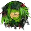 Round wall clock featuring preserved moss, botanical foliage, and a wood dial in a circular frame