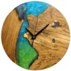 Round wooden wall clock featuring natural grain, epoxy resin river inlay, and black hands on white background.