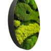 Side angle of round wall art with black frame, showing raised lime and dark green moss textures.