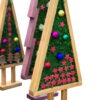 Three wooden Christmas tree figurines filled with green moss, colorful ball ornaments, and small red stars.
