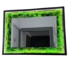 Rectangular mirror framed by bright green moss with an inner strip of white LED lighting, reflecting a doorway.