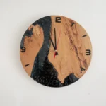 Black Wood and Epoxy Wall Clock with black dial, front view